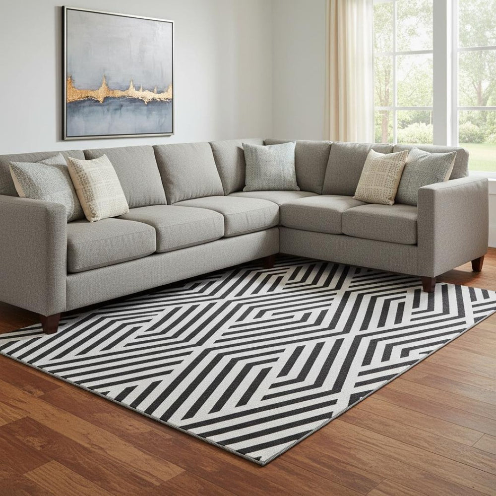 HomeRoots 10' X 14' Black and Ivory Geometric Area Rug - Washable, UV-Protected, Durable for High-Traffic Spaces 648520