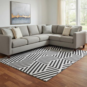 HomeRoots 10' X 14' Black and Ivory Geometric Area Rug - Washable, UV-Protected, Durable for High-Traffic Spaces 648520