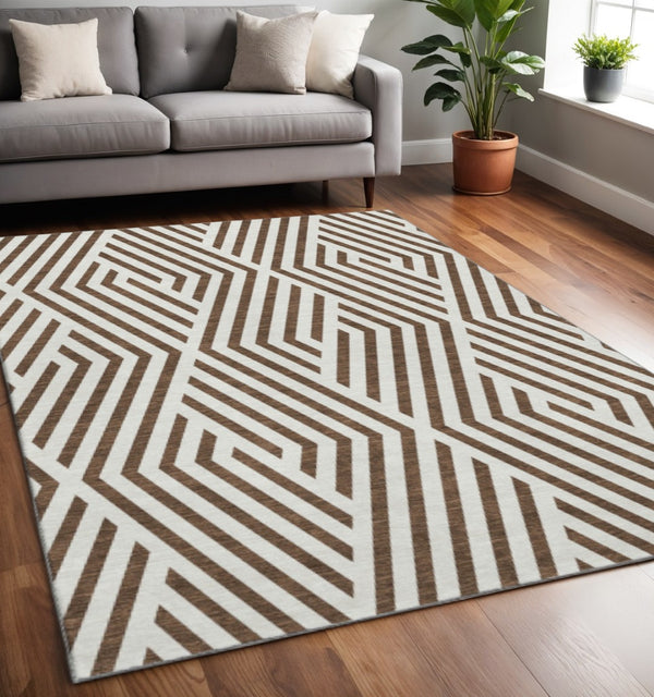 HomeRoots 5' X 8' Brown And Ivory Geometric Area Rug - Durable, Washable, UV-Protected for Modern Homes 648522