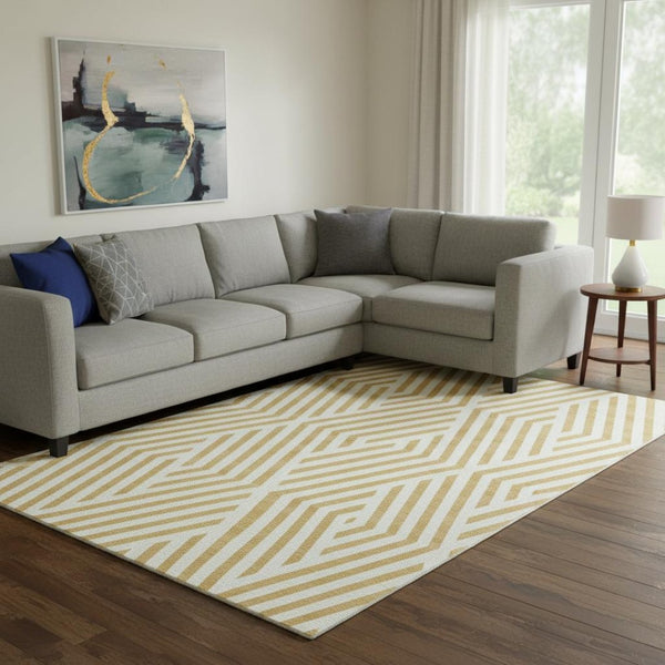 HomeRoots 8' X 10' Gold and Ivory Geometric Area Rug - Washable, UV Resistant for Modern Living Spaces 648536