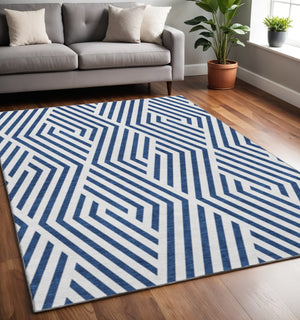 HomeRoots 5' X 8' Navy Blue & Ivory Geometric Washable Area Rug - UV Protected, Stain Resistant, Modern Style 648564
