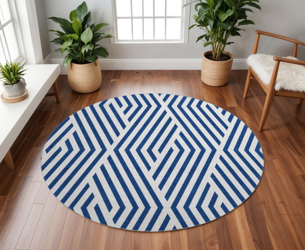 HomeRoots 8' Navy Blue & Ivory Geometric Round Rug - Washable, UV Protected, Soft & Durable for Any Space 648565