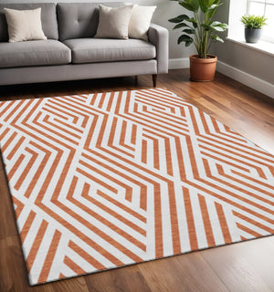 HomeRoots 5' X 8' Stylish Rust and Ivory Geometric Area Rug – Washable, UV Protected, Perfect for Homes with Kids! 648576
