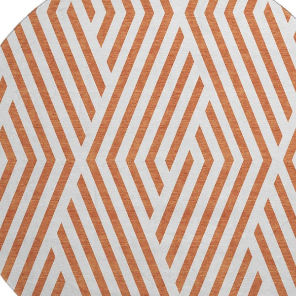 HomeRoots 8' Rust and Ivory Geometric Round Rug - Washable, UV Protected, Durable Design for Busy Homes 648577
