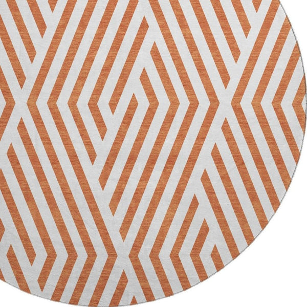 HomeRoots 8' Rust and Ivory Geometric Round Rug - Washable, UV Protected, Durable Design for Busy Homes 648577