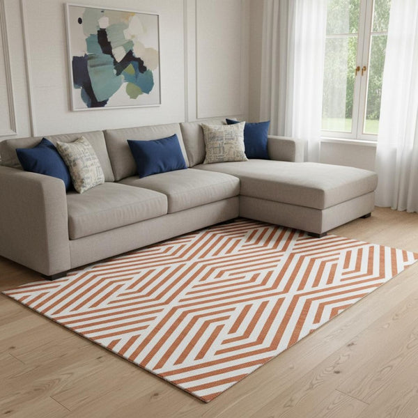 HomeRoots 8' X 10' Stylish Rust and Ivory Geometric Washable Area Rug with UV Protection for High Traffic Spaces 648578