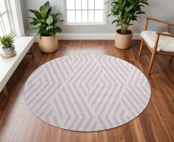 HomeRoots 8' Pink and Ivory Geometric Washable Round Rug - Durable, UV-Protected, Soft Underfoot for Any Room 648583