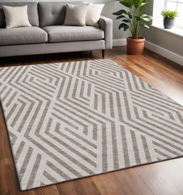 HomeRoots 5' X 8' Stylish Taupe and Ivory Geometric Area Rug - Washable, UV Protected, Durable for Homes 648594
