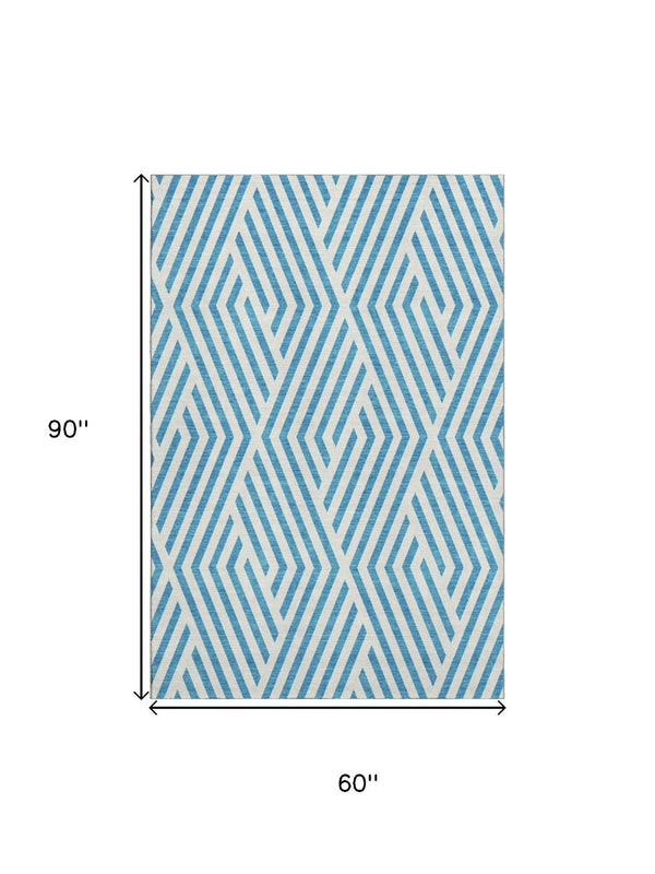 HomeRoots 5' Teal and Ivory Geometric Area Rug - Washable, UV Protected, Soft, Stylish, Perfect for Families! 648600