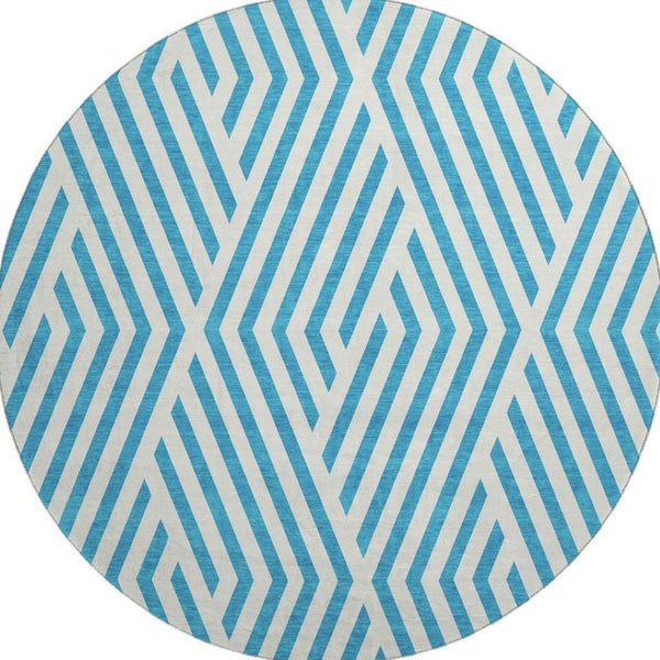 HomeRoots 8' Teal and Ivory Geometric Round Rug - Washable, UV-Protected, Durable & Stylish for Any Space! 648601