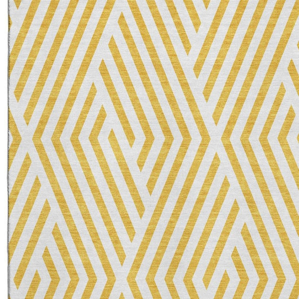 HomeRoots 5' X 8' Geometric Yellow and Ivory Washable Area Rug with UV Protection for Family-Friendly Spaces 648606