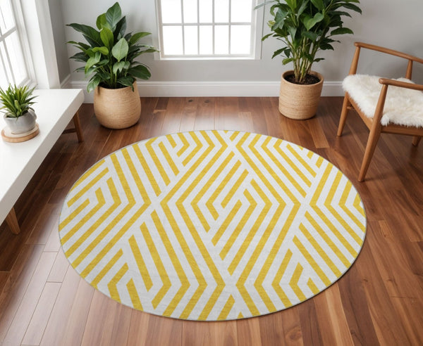 HomeRoots 8' Yellow and Ivory Geometric Washable Round Rug - Stylish, Durable, UV-Resistant for Active Homes 648607