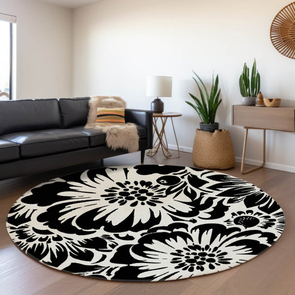 HomeRoots 8' Elegant Black and Ivory Floral Round Rug – Washable, UV Resistant, Perfect for Home and Patio Spaces 648619