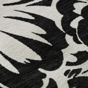 HomeRoots 8' Elegant Black and Ivory Floral Round Rug – Washable, UV Resistant, Perfect for Home and Patio Spaces 648619