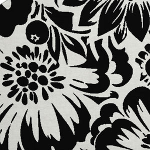 HomeRoots 8' Elegant Black and Ivory Floral Round Rug – Washable, UV Resistant, Perfect for Home and Patio Spaces 648619