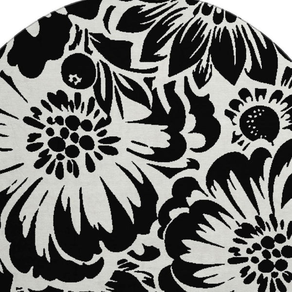 HomeRoots 8' Elegant Black and Ivory Floral Round Rug – Washable, UV Resistant, Perfect for Home and Patio Spaces 648619