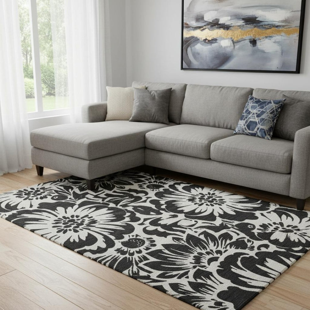 HomeRoots 8' X 10' Elegant Black and Ivory Floral Washable Area Rug with UV Protection for Stylish Living Spaces 648620