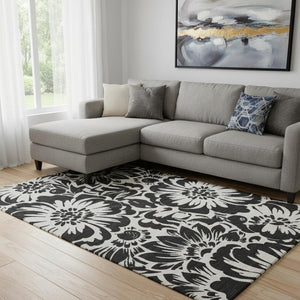 HomeRoots 8' X 10' Elegant Black and Ivory Floral Washable Area Rug with UV Protection for Stylish Living Spaces 648620