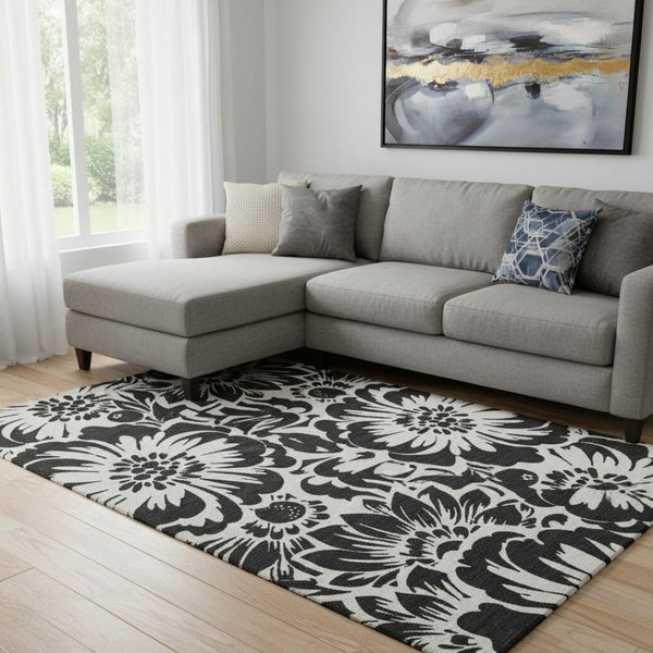 HomeRoots 8' X 10' Elegant Black and Ivory Floral Washable Area Rug with UV Protection for Stylish Living Spaces 648620