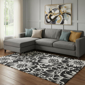 HomeRoots 10' X 14' Elegant Black and Ivory Floral Washable Area Rug with UV Protection for Stylish Spaces 648622
