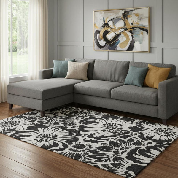 HomeRoots 10' X 14' Elegant Black and Ivory Floral Washable Area Rug with UV Protection for Stylish Spaces 648622