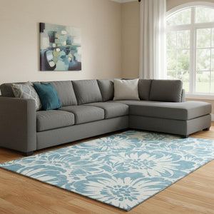 HomeRoots 10' X 14' Denim Blue Floral Area Rug – Washable, UV Protected, Stain Resistant for Family Spaces 648640
