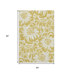 HomeRoots 5' X 8' Floral Washable Area Rug in Gold & Ivory - Durable, Stain-Resistant with UV Protection! 648642
