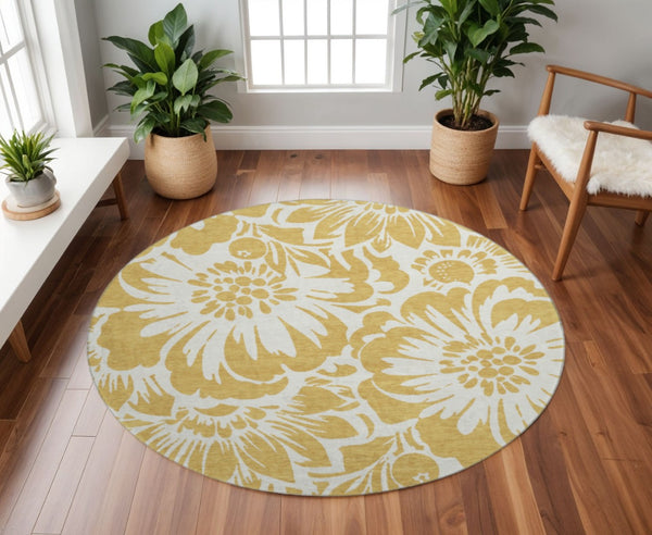 HomeRoots 8' Gold and Ivory Floral Round Rug - Washable, UV Protected, Durable, Stain Resistant for High-Traffic Areas 648643