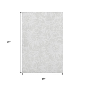 HomeRoots 5' X 8' Ivory and Cream Floral Rug - Washable, Stain Resistant, UV Protected for Everyday Elegance 648654