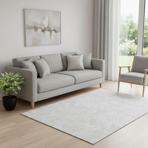 HomeRoots 5' X 8' Ivory and Cream Floral Rug - Washable, Stain Resistant, UV Protected for Everyday Elegance 648654