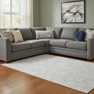 HomeRoots 10' X 14' Ivory Cream Floral Washable Area Rug - UV Protected, Stain Resistant & Durable for Homes 648658
