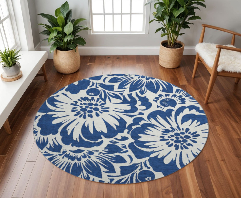 HomeRoots 8' Navy Blue Floral Round Rug - Washable, UV-Protected, and Stain-Resistant for Stylish Spaces 648667
