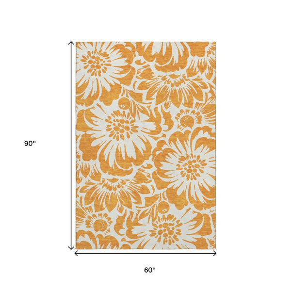 HomeRoots 5' X 8' Orange and Ivory Floral Area Rug - Durable, Washable, UV-Protected for Vibrant Living Spaces 648672