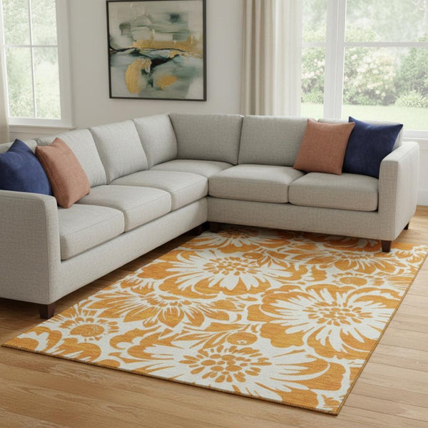 HomeRoots 10' X 14' Washable Orange and Ivory Floral Area Rug with UV Protection for Stylish Living Spaces 648676