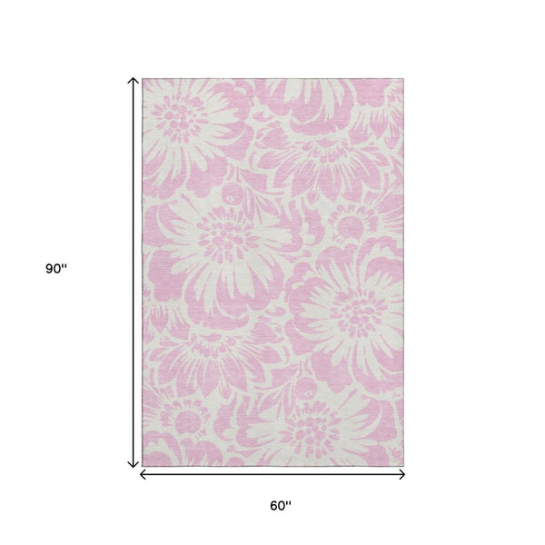 HomeRoots 5' X 8' Pink and Ivory Floral Area Rug - Washable, UV-Protected, Stylish and Durable for Any Room! 648684