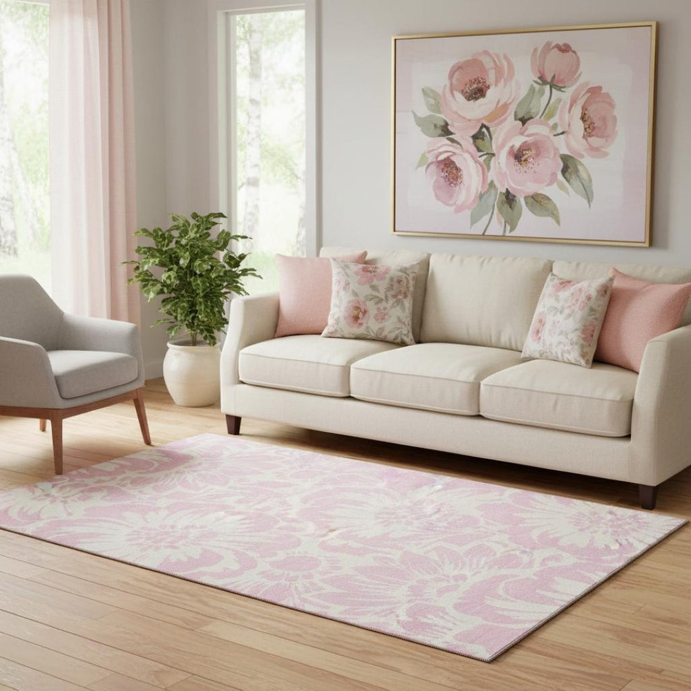 HomeRoots 5' X 8' Pink and Ivory Floral Area Rug - Washable, UV-Protected, Stylish and Durable for Any Room! 648684