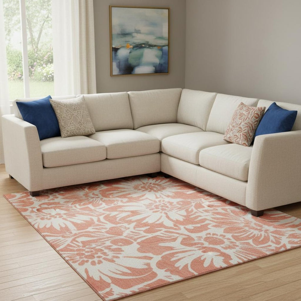 HomeRoots 9' X 12' Salmon and Ivory Floral Area Rug - Washable, UV Protected, Durable Design for Homes with Pets 648699