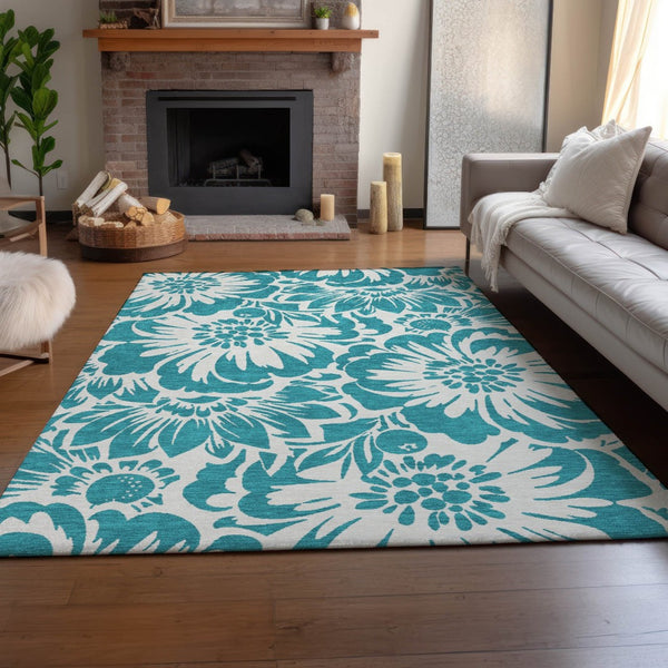 HomeRoots 9' X 12' Teal Floral Washable Area Rug - Durable, Stain Resistant, UV Protected for High-Traffic Areas 648711