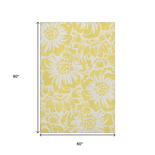 HomeRoots 5' Yellow and Ivory Floral Washable Area Rug - UV Protected, Stain Resistant, Perfect for Families 648714