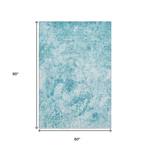 HomeRoots 5' X 8' Teal And Ivory Abstract Area Rug - Washable, UV Protected, Stain Resistant for Modern Spaces 648792