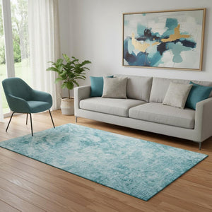 HomeRoots 5' X 8' Teal And Ivory Abstract Area Rug - Washable, UV Protected, Stain Resistant for Modern Spaces 648792