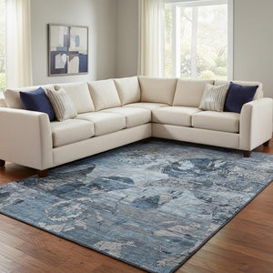HomeRoots 9' X 12' Denim Blue & Gray Abstract Washable Area Rug - Durable, UV-Protected for High-Traffic Spaces 648843