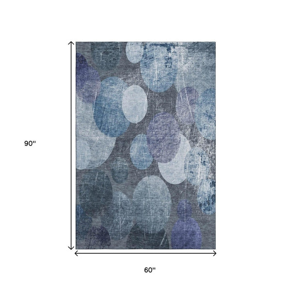 HomeRoots 5' X 8' Blue and Ivory Abstract Washable Area Rug - Stylish, Durable, and UV-Protected for Homes 648888