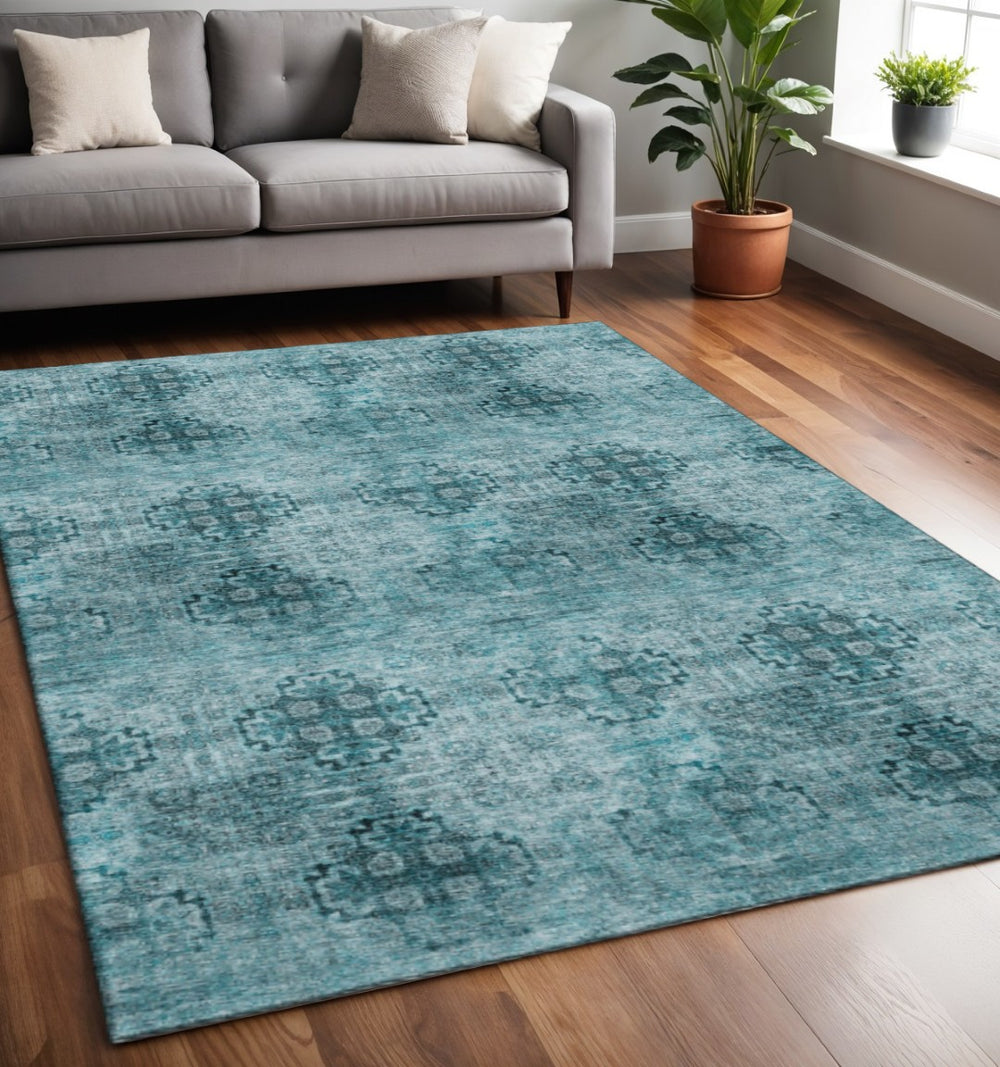 HomeRoots 5' X 8' Teal and Ivory Floral Medallion Area Rug – Stain Resistant, UV Protected, Easy Care Decor 648954
