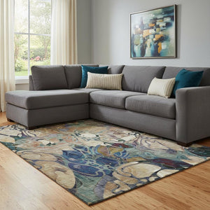 HomeRoots 8' X 10' Floral Washable Area Rug in Beige, Blue & Purple - Stain Resistant & UV Protected Design 648962
