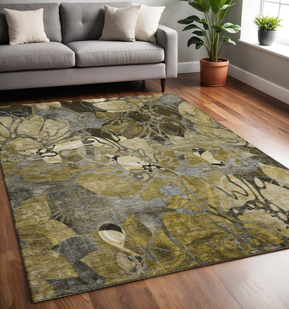 HomeRoots 5' X 8' Floral Area Rug in Brown, Beige & Gold - Washable, UV-Protected, Perfect for Homes with Pets! 648972