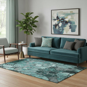 HomeRoots 5' X 8' Teal and Gray Floral Area Rug - Washable, Stain Resistant, UV Protected for Modern Homes 649002