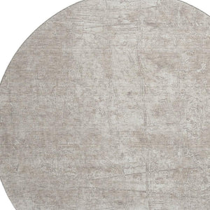 HomeRoots 8' Ivory and Cream Abstract Round Rug – Washable, Stain-Resistant, UV Protected for Busy Homes! 649033