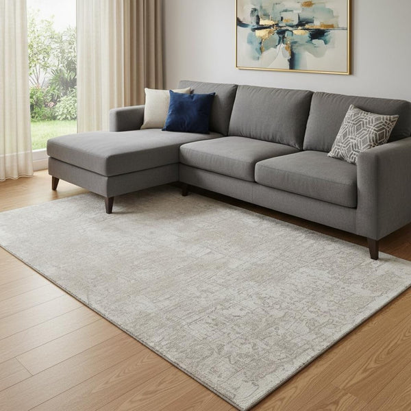 HomeRoots 10' X 14' Ivory and Cream Abstract Area Rug - Washable, UV-Protected, Soft & Durable for High Traffic Homes 649036