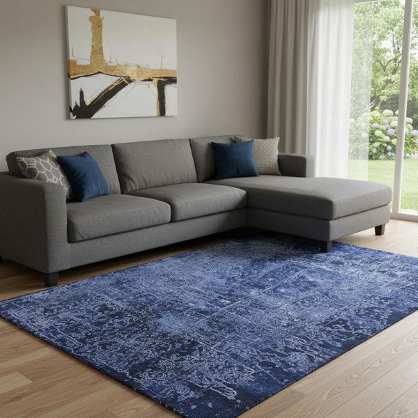 HomeRoots 9' X 12' Navy Blue And Ivory Abstract Washable Area Rug - Durable, UV Protected & Stain-Resistant Design 649047